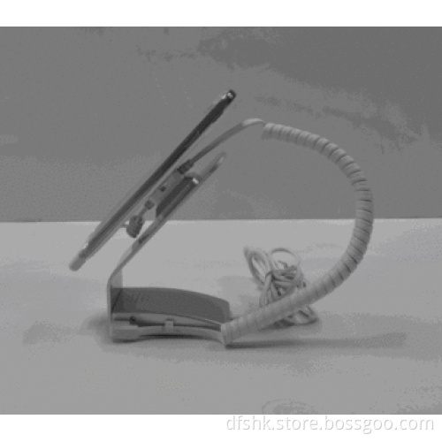 retail automation system that secure and charge mobile phone